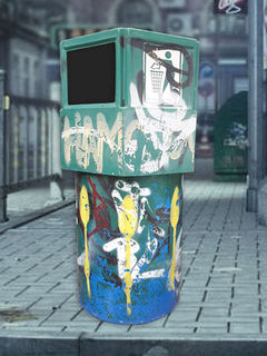 Green Plastic Graffiti Trash Rubbish Bin.