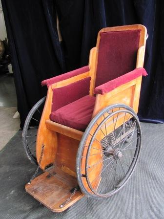 Wheelchair (i) , solid wood frame, purple seat