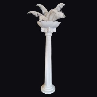 White Planter Column With White Feather Arrangement
