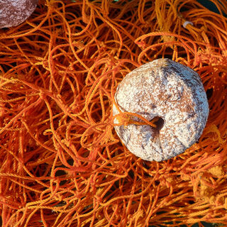 Fishing Net - Orange w/ 3 Polystyrene Floats At One End - Worn (1.5m x 9m)